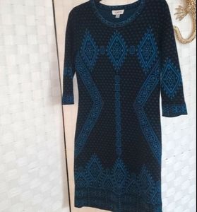 Very pretty sweater dress. Warm and flattering
